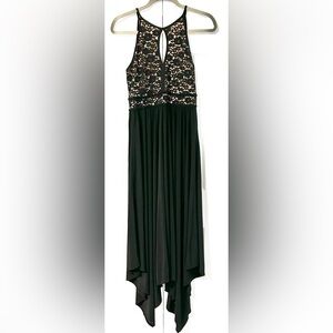 Black, long, formal dress with sequenced lace top and asymmentrical hemline.